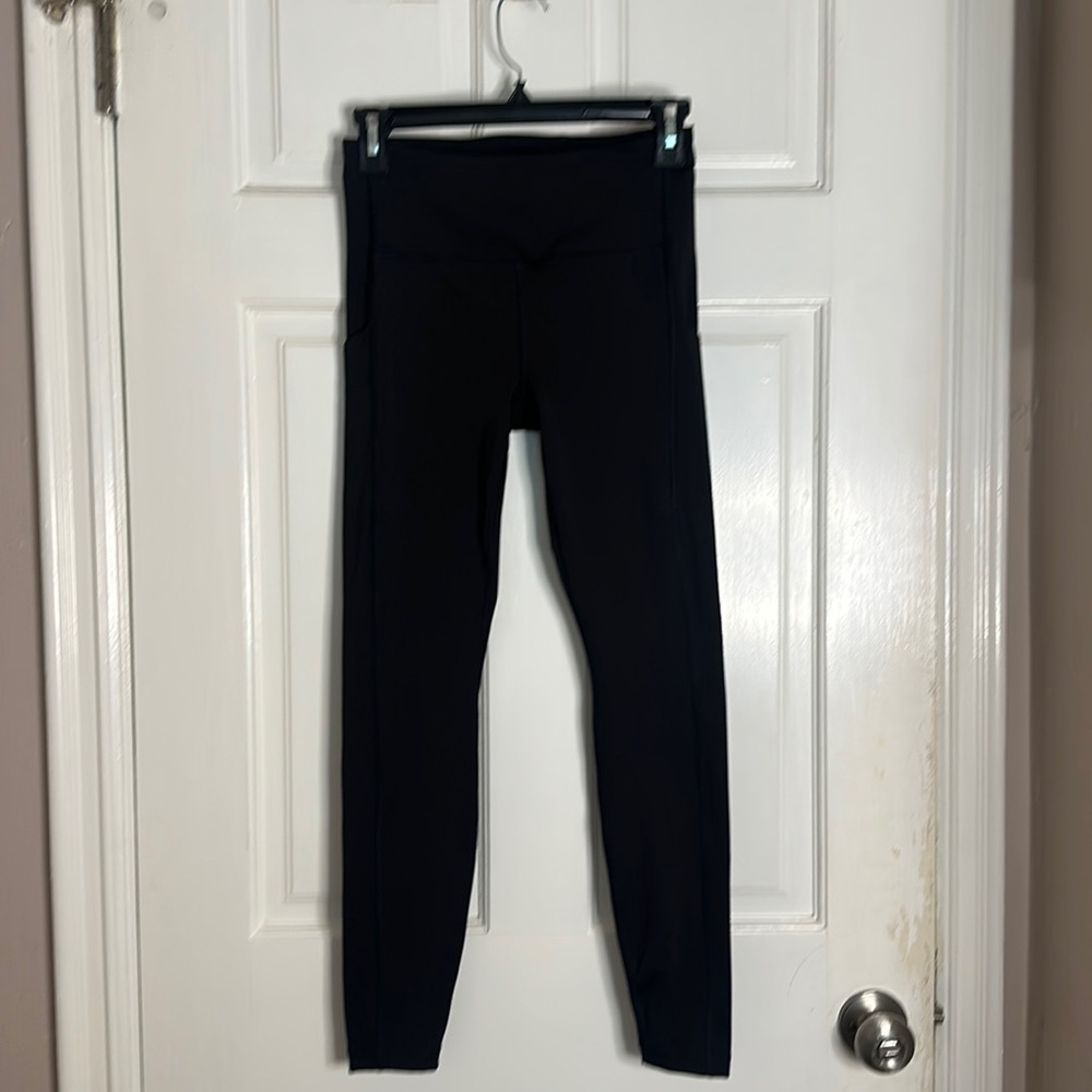 Black Athleta women’s workout pants worn once. Size small, stash pocket.